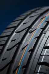 Cartire Close-up on blue black background- Stock Photo or Stock Video of rcfotostock | RC Photo Stock