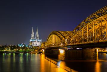 cathedral in cologne and hohenzollern bridge at night- Stock Photo or Stock Video of rcfotostock | RC-Photo-Stock