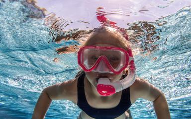 child with snorkeling mask diving in underwater in swimming pool. water sport outdoor adventure, swimming lessons on summer holidays.- Stock Photo or Stock Video of rcfotostock | RC Photo Stock