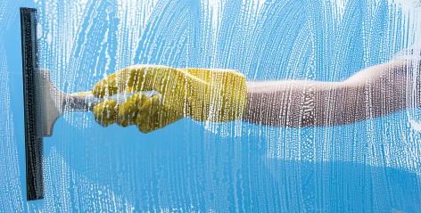 Cleaning concept - Young Man washing window- Stock Photo or Stock Video of rcfotostock | RC Photo Stock