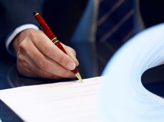 Close up of businessman signing a contract.- Stock Photo or Stock Video of rcfotostock | RC-Photo-Stock