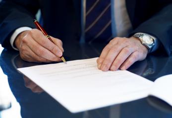 Close up of businessman signing a contract.- Stock Photo or Stock Video of rcfotostock | RC-Photo-Stock