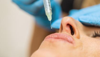 Close up of cosmetic Anti-aging face injection in female lips. cosmetologist using syringe with special liquid. Concept of cosmetology, beauty.- Stock Photo or Stock Video of rcfotostock | RC Photo Stock