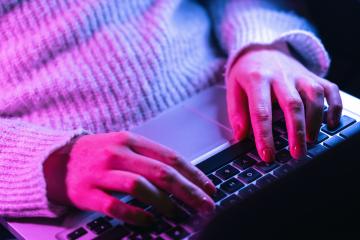 Close up woman hands typing on laptop keyboard, professional online gamer hand fingers on notebook keyboard in neon color, sitting at  gaming desk, woman chatting, browsing apps at home- Stock Photo or Stock Video of rcfotostock | RC Photo Stock