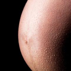 close-up from a pregnant belly with rain drops- Stock Photo or Stock Video of rcfotostock | RC Photo Stock