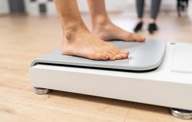 Close-up of bare feet stepping onto a modern body composition scale in a fitness or medical setting during Inbody test : Stock Photo or Stock Video Download rcfotostock photos, images and assets rcfotostock | RC Photo Stock.: