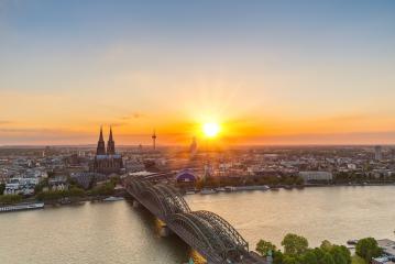Cologne Cathedral and Hohenzollern Bridge at sunset- Stock Photo or Stock Video of rcfotostock | RC Photo Stock