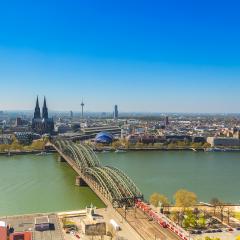 Cologne Cathedral and Hohenzollern bridge in spring- Stock Photo or Stock Video of rcfotostock | RC Photo Stock