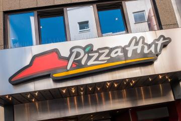 COLOGNE, GERMANY OCTOBER, 2017: Pizza Hut Restaurant Sign. It is an American restaurant chain and international franchise that offers different styles of pizza.- Stock Photo or Stock Video of rcfotostock | RC Photo Stock