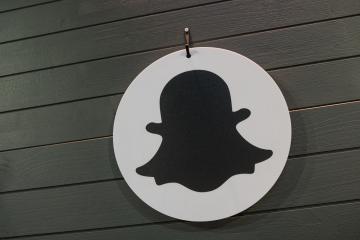 COLOGNE, GERMANY SEPTEMBER, 2017: Snapchat logo on a wall. Snapchat is a popular social media application for sharing messages, images and videos.- Stock Photo or Stock Video of rcfotostock | RC Photo Stock