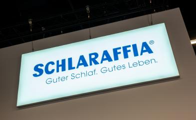 COLOGNE, GERMANY SEPTEMBER, 2019: Schlaraffia logo sign at a trade show booth. Schlaraffia is the traditional brand in the field of sleep systems.  : Stock Photo or Stock Video Download rcfotostock photos, images and assets rcfotostock | RC Photo Stock.: