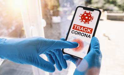 coronavirus tracker app on a mobile smartphone. Close up of woman tracking crowd of people in a smartphone screen application. Hand holding smart device. Mockup website. covid-19 corona virus tracker : Stock Photo or Stock Video Download rcfotostock photos, images and assets rcfotostock | RC Photo Stock.: