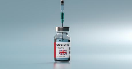 COVID-19 Coronavirus mRNA Vaccine and Syringe with flag of england united kingdom on the label. Concept Image for SARS cov 2 infection pandemic- Stock Photo or Stock Video of rcfotostock | RC-Photo-Stock