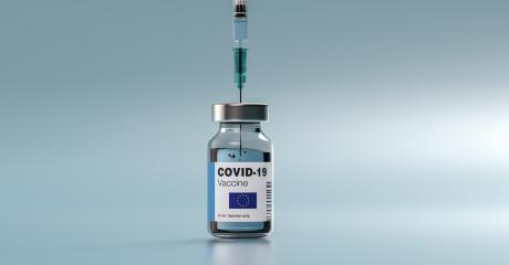 COVID-19 Coronavirus mRNA Vaccine and Syringe with flag of Europe on the label. Concept Image for SARS cov 2 infection pandemic- Stock Photo or Stock Video of rcfotostock | RC Photo Stock