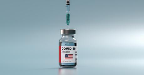 COVID-19 Coronavirus mRNA Vaccine and Syringe with flag of the USA America on the label. Concept Image for SARS cov 2 infection pandemic- Stock Photo or Stock Video of rcfotostock | RC Photo Stock