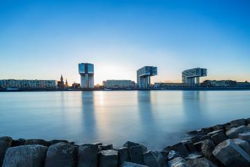 crane houses in cologne at sunset with stony coast- Stock Photo or Stock Video of rcfotostock | RC Photo Stock