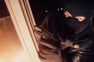 criminal burglar using gun to break into a house at night  : Stock Photo or Stock Video Download rcfotostock photos, images and assets rcfotostock | RC-Photo-Stock.: