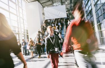 crowd of anonymous blurred business people at a tradeshow- Stock Photo or Stock Video of rcfotostock | RC Photo Stock