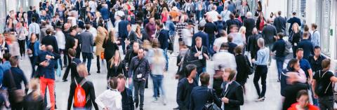 Crowd of anonymous blurred people at a trade show- Stock Photo or Stock Video of rcfotostock | RC Photo Stock