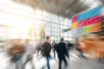 crowd of anonymous business people at a trade show in a modern hall- Stock Photo or Stock Video of rcfotostock | RC-Photo-Stock