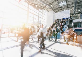 crowd of blurred business people at a trade show, with copy space banner- Stock Photo or Stock Video of rcfotostock | RC Photo Stock