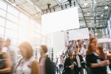crowd of blurred business people at a trade show, with copy space banner- Stock Photo or Stock Video of rcfotostock | RC-Photo-Stock