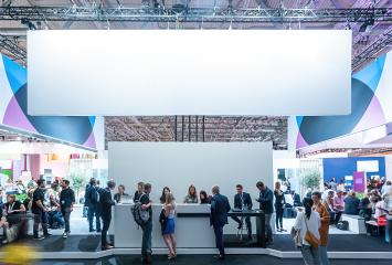 Crowd of people at a trade show booth with a banner and the text Trade Fair : Stock Photo or Stock Video Download rcfotostock photos, images and assets rcfotostock | RC-Photo-Stock.: