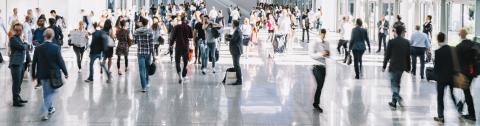 crowd of trade fair visitors walking in a clean futuristic corridor- Stock Photo or Stock Video of rcfotostock | RC Photo Stock