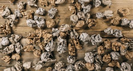 crumpled paper balls on a wooden table. Brainstorming Concept image- Stock Photo or Stock Video of rcfotostock | RC Photo Stock