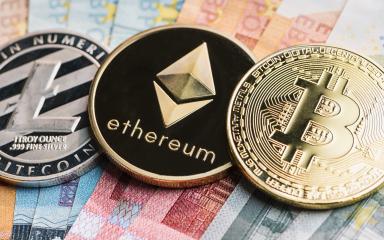 cryptocurrency coins - Litecoin, Bitcoin, Ethereum on top of Euro banknotes- Stock Photo or Stock Video of rcfotostock | RC Photo Stock