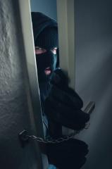 dangerous masked burglar breaking into a victim's home door- Stock Photo or Stock Video of rcfotostock | RC Photo Stock
