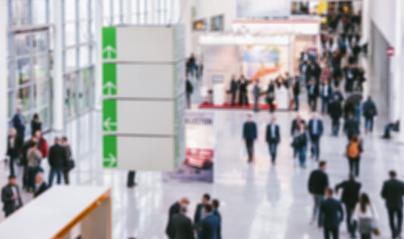 defocused people walking in trade show hall- Stock Photo or Stock Video of rcfotostock | RC-Photo-Stock