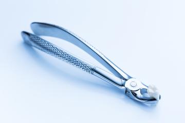 dental forceps for wisdom tooth extraction : Stock Photo or Stock Video Download rcfotostock photos, images and assets rcfotostock | RC Photo Stock.: