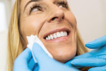 dentist checks cleaned teeth after teeth cleaning. Teeth whiteni : Stock Photo or Stock Video Download rcfotostock photos, images and assets rcfotostock | RC Photo Stock.: