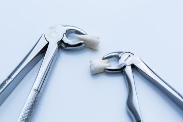 Dentist wisdom tooth forceps instruments - Stock Photo or Stock Video of rcfotostock | RC-Photo-Stock