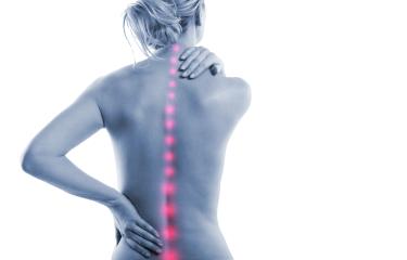 A woman holding her lower back and shoulder, illustrating back pain with highlighted red spots along the spine, representing discomfort or spinal issues in a medical context : Stock Photo or Stock Video Download rcfotostock photos, images and assets rcfotostock | RC Photo Stock.: