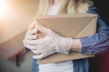 Dispatch postman bring parcels and post in covid 19 quarantine to the front home door with a face mask ffp2 and protection gloves : Stock Photo or Stock Video Download rcfotostock photos, images and assets rcfotostock | RC Photo Stock.: