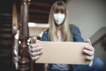 Dispatch postman bring parcels and post in covid 19 quarantine to the front home door with a face mask ffp 2 and protection gloves : Stock Photo or Stock Video Download rcfotostock photos, images and assets rcfotostock | RC Photo Stock.: