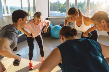 Diverse gym group doing dumbbell exercises, sunlight streaming through windows : Stock Photo or Stock Video Download rcfotostock photos, images and assets rcfotostock | RC Photo Stock.: