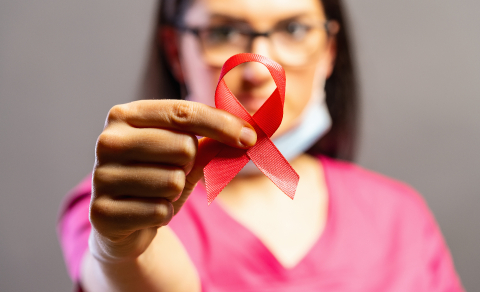 Doctor holding pink ribbon. Breast cancer awareness concept : Stock Photo or Stock Video Download rcfotostock photos, images and assets rcfotostock | RC-Photo-Stock.: