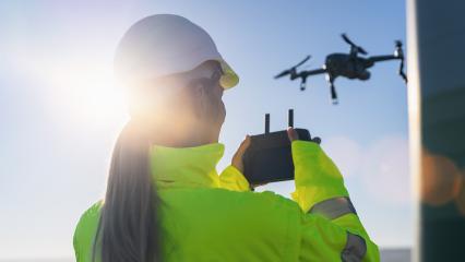 Drone inspection. Female Operator inspecting Wind turbine with d- Stock Photo or Stock Video of rcfotostock | RC Photo Stock