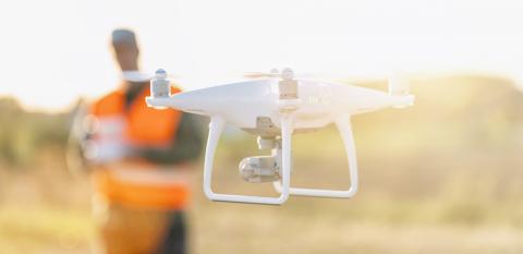 Drone operated by construction worker on building site- Stock Photo or Stock Video of rcfotostock | RC-Photo-Stock