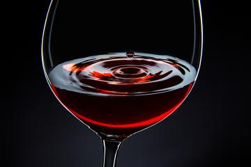 Drop falling in a red wine glass against black backround : Stock Photo or Stock Video Download rcfotostock photos, images and assets rcfotostock | RC Photo Stock.: