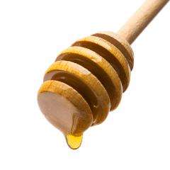 drop of honey on a honey dipper : Stock Photo or Stock Video Download rcfotostock photos, images and assets rcfotostock | RC-Photo-Stock.:
