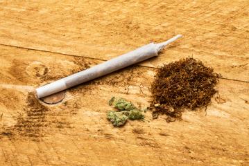 Drugs of marijuana with joint and tobacco : Stock Photo or Stock Video Download rcfotostock photos, images and assets rcfotostock | RC-Photo-Stock.: