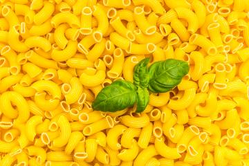 Elbow macaroni with basil texture : Stock Photo or Stock Video Download rcfotostock photos, images and assets rcfotostock | RC-Photo-Stock.: