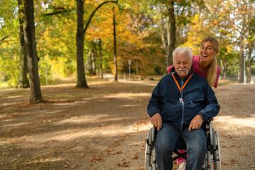 Elderly man in wheelchair wearing SOS button, with nurse in park during autumn  : Stock Photo or Stock Video Download rcfotostock photos, images and assets rcfotostock | RC Photo Stock.: