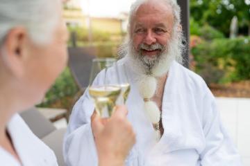 Elderly man with a white beard smiling and toasting with a glass of champagne : Stock Photo or Stock Video Download rcfotostock photos, images and assets rcfotostock | RC Photo Stock.: