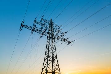 Electricity pylon against blue sky and dusk sunset- Stock Photo or Stock Video of rcfotostock | RC-Photo-Stock