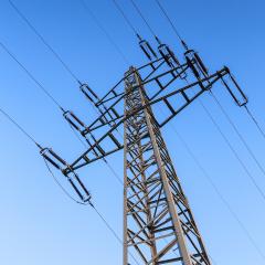 Electricity pylon close-up power pole high voltage against blue sky- Stock Photo or Stock Video of rcfotostock | RC Photo Stock